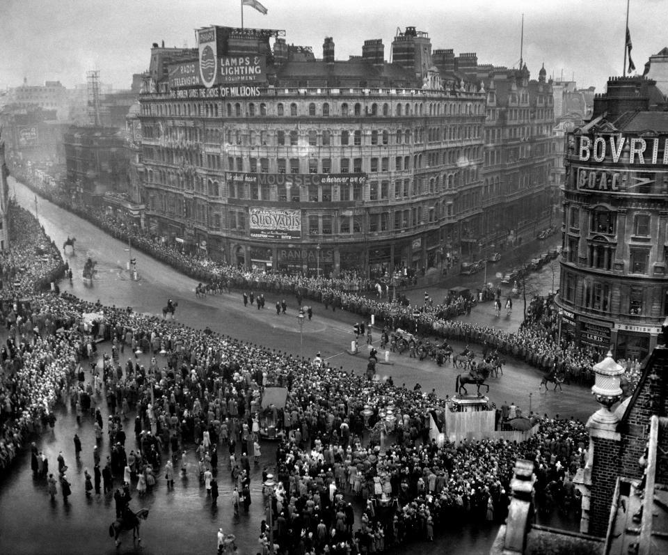 The cortege of the coffin of King George VI passing through the crowd in Trafalgar Square on it's way to Westminster Hall to lie in state.   (Photo by PA Images via Getty Images)