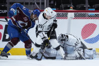 Colorado Avalanche center Pierre-Edouard Bellemare (41) scores a goal against Los Angeles Kings goaltender Calvin Petersen (40) as center Rasmus Kupari (89) defends during the first period of an NHL hockey game Wednesday, May, 12, 2021, in Denver. (AP Photo/Jack Dempsey)