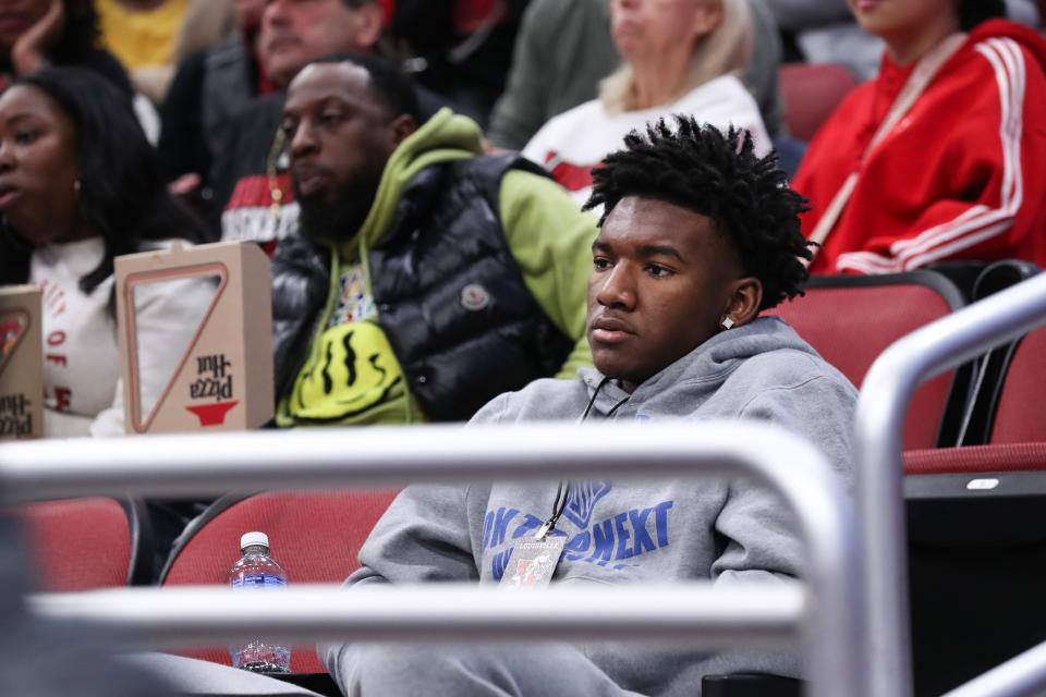 Karter Knox watches Louisville's game against Pepperdine in December at the KFC Yum! Center. Watching the game was part of his official visit with U of L. Knox is scheduled to take an official visit to Kentucky next week.