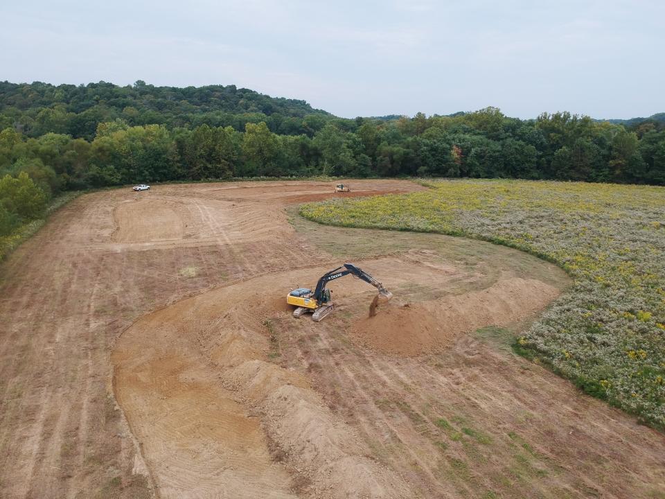 Construction work to scrape and dig shallow ditches in fields at the Sam Shine Foundation Preserve that will become wetlands in the nature preserve in northwest Monroe County.
