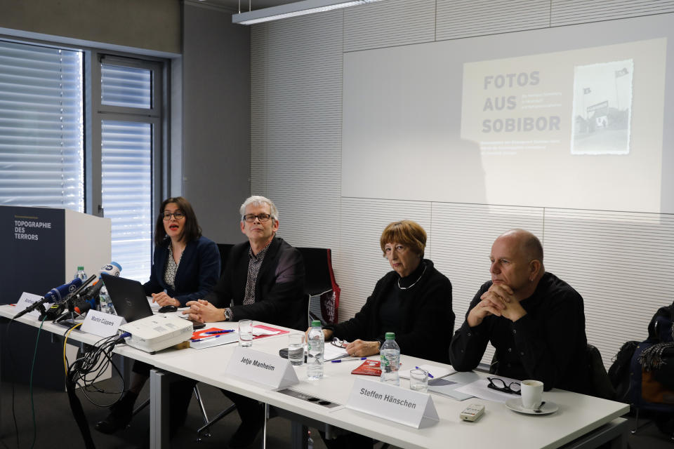 From left: The director of the foundation Topography of Terror Andrea Riedel, historian Martin Cueppers, granddaughter of a Sobibor survivor Jette Manheim and Steffen Haenschen of the education centre Bildungswerk Stansilaw Hanz, attend the podium during a news conference of newly discovered photos from Sobibor Nazi death camp in Berlin, Germany, Tuesday, Jan. 28, 2020. (AP Photo/Markus Schreiber)