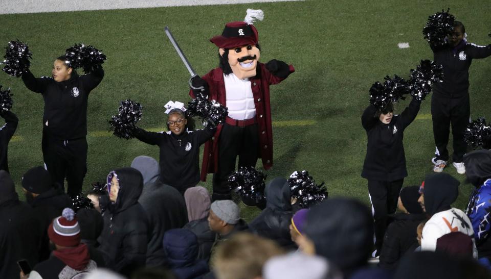 The Caravel mascot and cheerleaders stay active late in Wilmington Friends' 10-7 win in the DIAA Class 2A championship game at Delaware Stadium, Saturday, Dec 10, 2022.