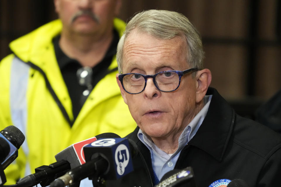 Ohio Gov. Mike DeWine meets with reporters after touring the Norfolk Southern train derailment site in East Palestine, Ohio, Monday, Feb. 6, 2023. (AP Photo/Gene J. Puskar)