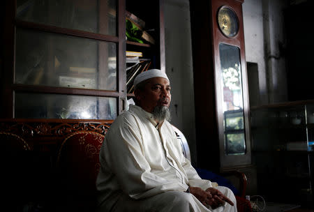 Cleric Umar Said, member of a hardline Islamist group poses during an interview in Yogyakarta, Indonesia, September 23, 2018. REUTERS/Kanupriya Kapoor