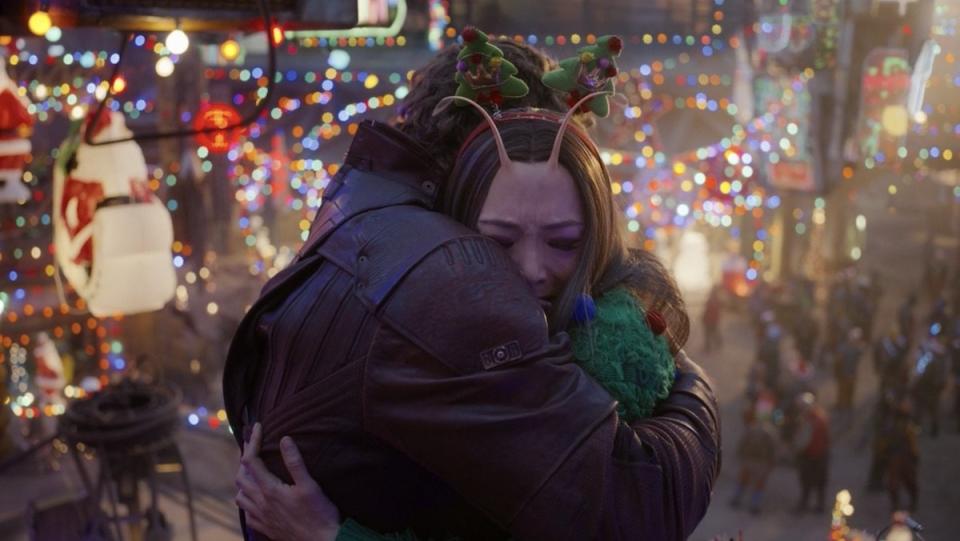 Peter Quill hugs his sister Mantis on Knowhere in The Guardians of the Galaxy Holiday Special