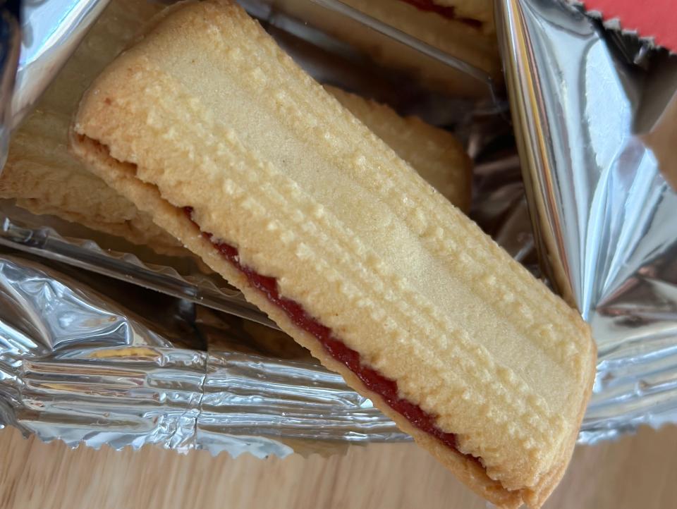 Trader Joe's all-butter shortbread sandwich cookies with raspberry filling in foil package