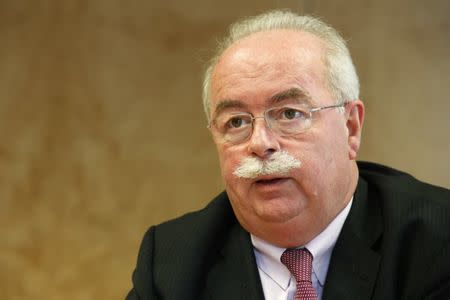 Christophe de Margerie, CEO of the French oil and gas company Total SA, speaks during an interview with Reuters in Paris July 7, 2014. REUTERS/Benoit Tessier