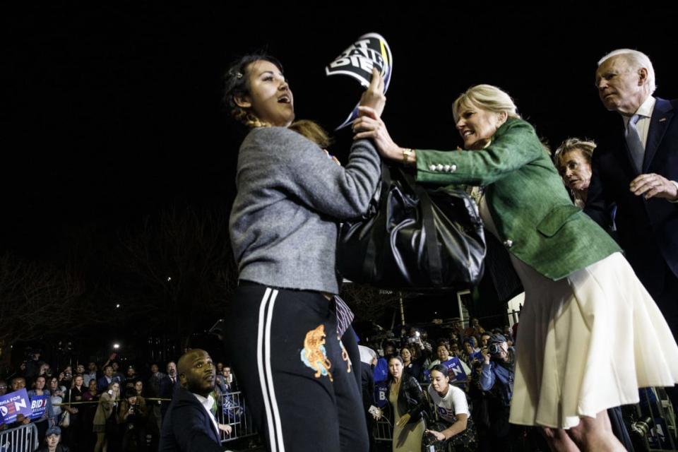 <div class="inline-image__caption"><p>Joe Biden watched as his wife, Jill, blocked a protester from arriving on stage during an primary night rally in the Baldwin Hills neighborhood of Los Angeles, California, U.S., on Tuesday, March 3, 2020.</p></div> <div class="inline-image__credit">Fallon/Bloomberg via Getty</div>