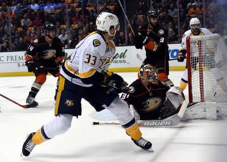 Nashville Predators center Colin Wilson (33) shoots the puck past Anaheim Ducks goalie Frederik Andersen (31) for a goal in the first period in game seven of the first round of the 2016 Stanley Cup Playoffs at Honda Center. Mandatory Credit: Kirby Lee-USA TODAY Sports