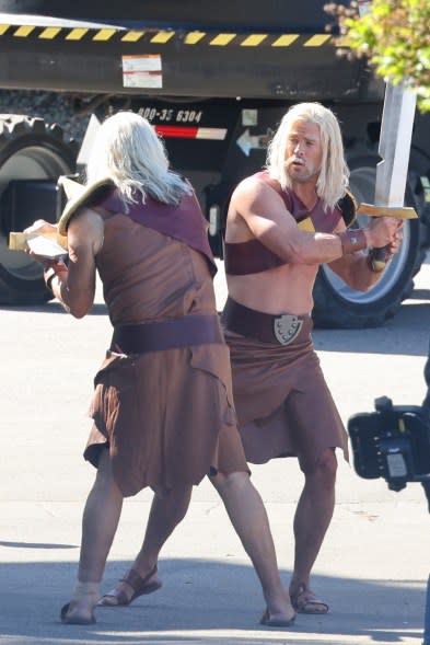 Chris Hemsworth in costume with a sword on his back on the set of a 'Clash Of Clans' commercial in Los Angeles.