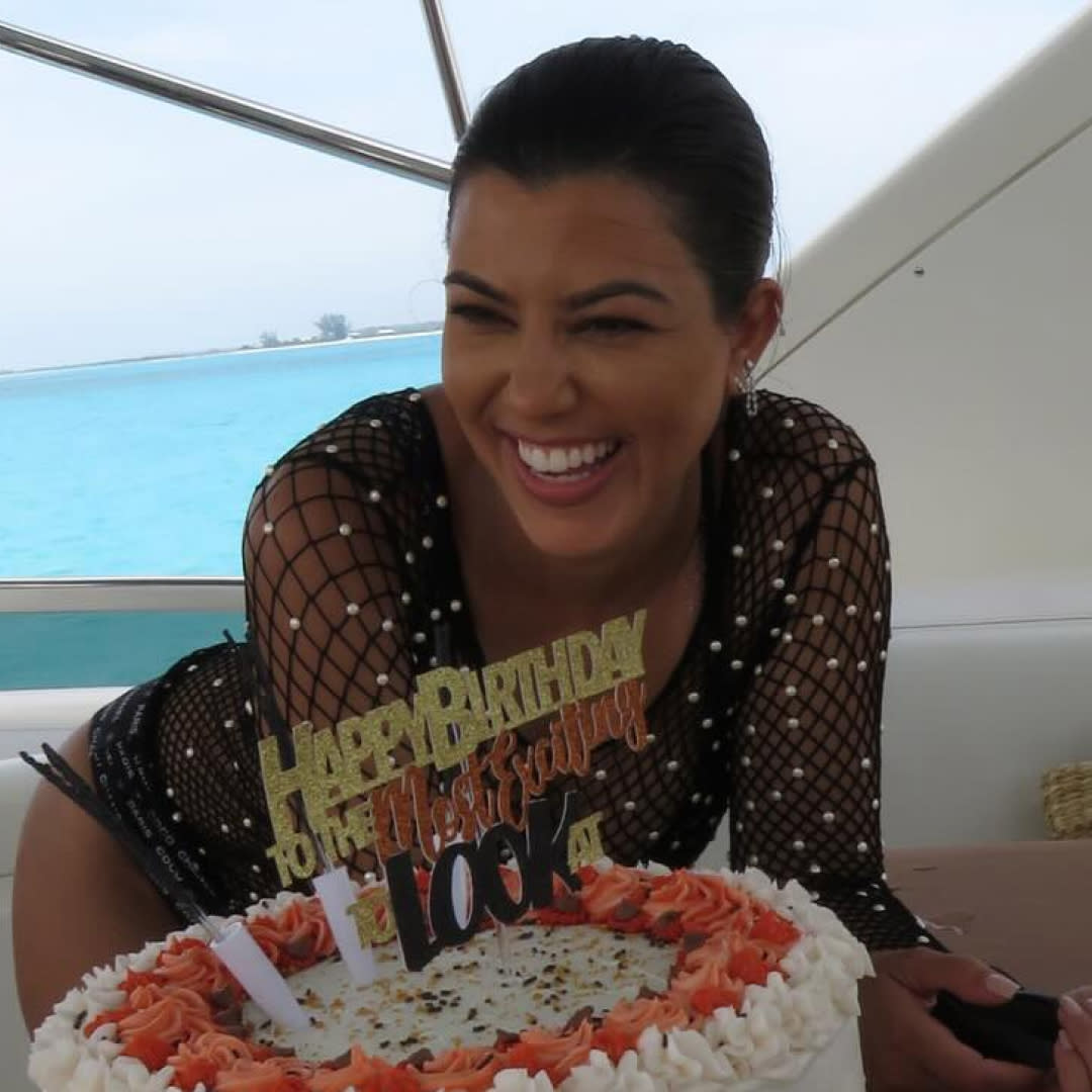  Kourtney Kardashian. with birthday cake. 
