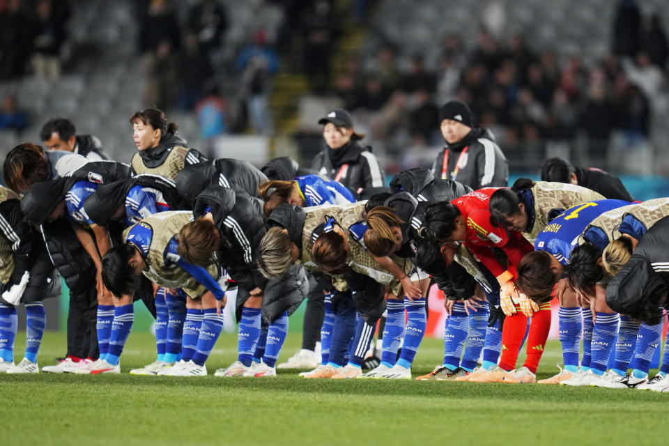 Japan players bow to their fans at the end of the Women's World Cup quarterfinal soccer match between Japan and Sweden at Eden Park in Auckland, New Zealand, Friday, Aug. 11, 2023. Sweden won 2-1. (AP Photo/Abbie Parr)