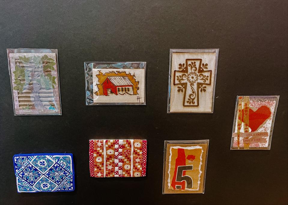 Part of Tim Wiegenstein’s artist trading card collection. One of the only rules is that they cannot be larger than 2 ½ x 3 ½ inches. These are made using FIMO clay, corrugated cardboard and wood.
