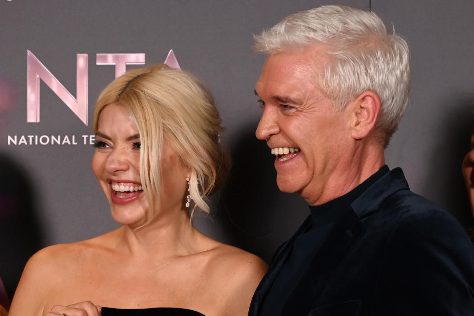 LONDON, ENGLAND - OCTOBER 13: Holly Willoughby and Phillip Schofield with the Best Daytime award for 'This Morning' in the winners' room at the National Television Awards 2022 at OVO Arena Wembley on October 13, 2022 in London, England. (Photo by Dave J Hogan/Getty Images)