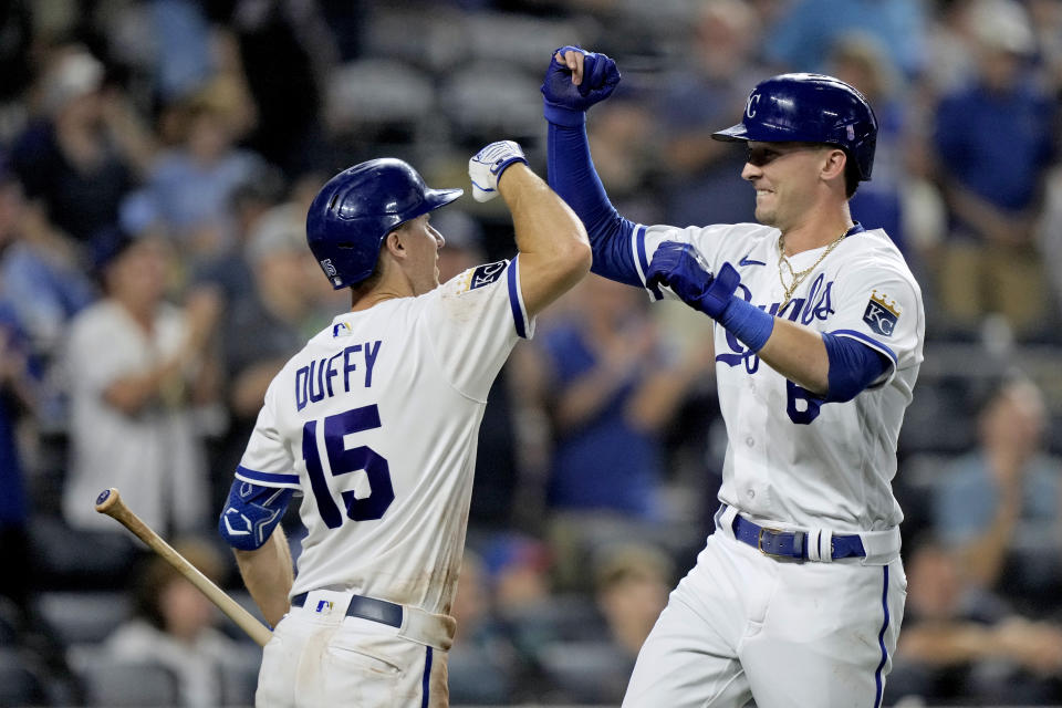 Kansas City Royals' Drew Waters, right, celebrates with Matt Duffy (15) after hitting a solo home run during the eighth inning of a baseball game against the New York Mets Wednesday, Aug. 2, 2023, in Kansas City, Mo. (AP Photo/Charlie Riedel)