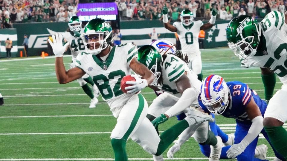 New York Jets wide receiver Xavier Gipson (82) scores a touchdown in overtime on a punt return against the Buffalo Bills.