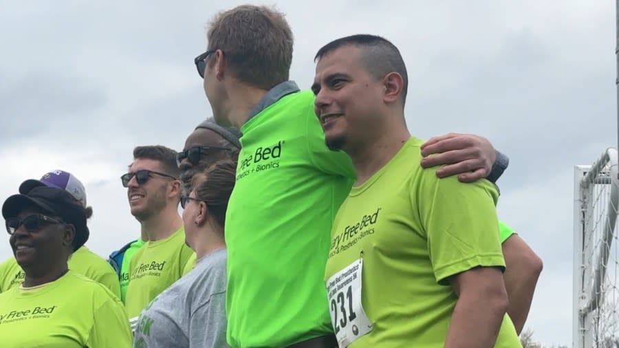 Alex Trevino (right) competes in the Mary Free Bed Limb Loss Awareness 5K on April 27, 2024.