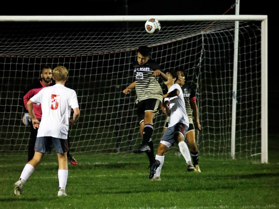 Laired Williamson heads the ball to save a goal during River View's 2-1 win against visiting Dover this season. Williamson's efforts landed him as the Tribuneland Boys Soccer Player of the Year.