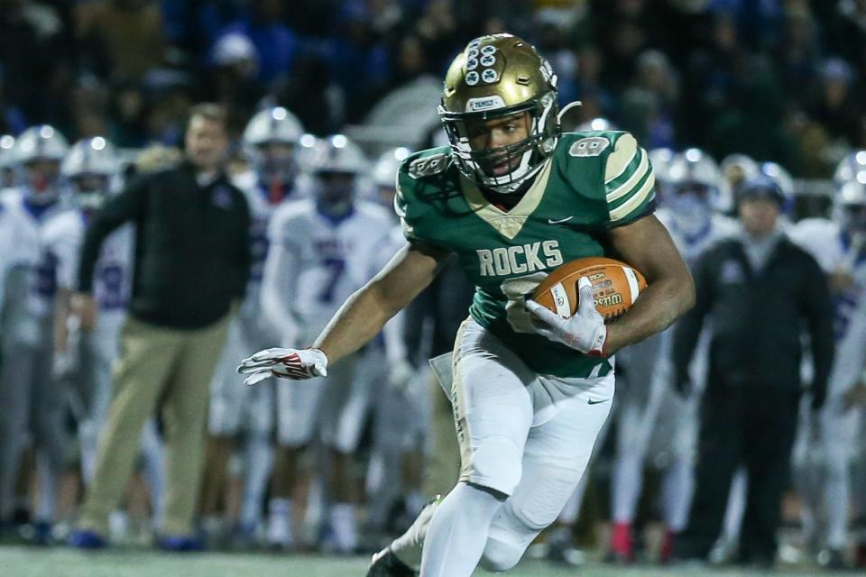 Westfield's Kendall Garnett lll (8) looks for some open space to run on the hand off as Hamiliton Southeastern takes on Westfield High School in the IHSAA Class 6A Regional Championship, Nov 10, 2023; Westfield, IN, USA; at Westfield High School.