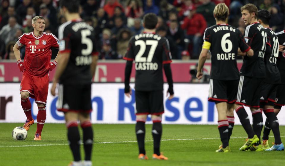 Bayern's Bastian Schweinsteiger waits for a free kick during the German first division Bundesliga soccer match between FC Bayern Munich and Bayer 04 Leverkusen, in Munich, southern Germany, Saturday, March 15, 2014. (AP Photo/Matthias Schrader)