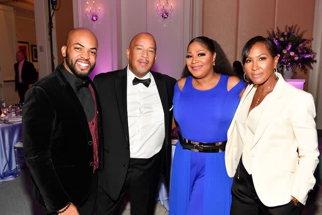 <p>Paras Griffin/Getty</p> David Robinson, Warren Huntley, Trina Braxton and Terri J. Vaughn attend the Legacy of Love Gala on Aug. 9, 2023 in Atlanta