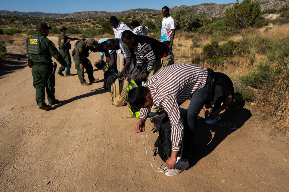 JACUMBA HOT SPRINGS, CA - JUNE 14: Migrants are processed by U.S. Border Patrol agents after crossing into the U.S. from Mexico on June 14, 2024 in Jacumba Hot Springs, California. U.S. President Joe Biden on June 4 unveiled immigration order severely limiting asylum-seeker crossings. (Photo by Qian Weizhong/VCG via Getty Images)