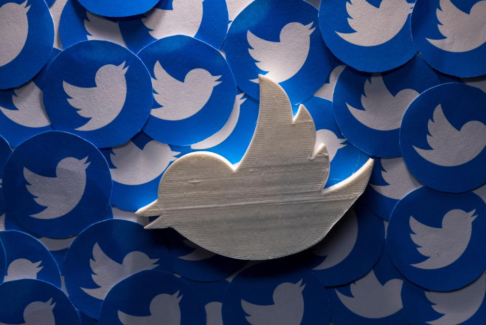 A 3D-printed Twitter logo on non-3D printed Twitter logos is seen in this picture illustration taken April 28, 2022. REUTERS/Dado Ruvic/Illustration