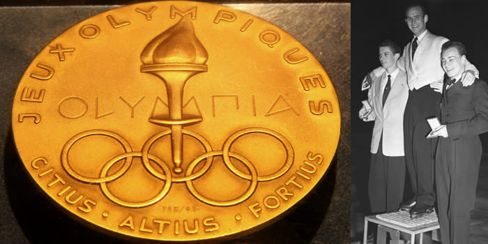 <p>A gold medal from the 1952 Olympics in Oslo, Sweden. It was given to Dick Button for winning the men’s singles figure skating event.<br>(AP Photo/Tina Fineberg; Winners of the men’s figure skating event–Helmut Seibt Austria, silver; Dick Button USA, gold; James Grogan USA, bronze/photo by Reg Birkett/Keystone/Getty Images) </p>