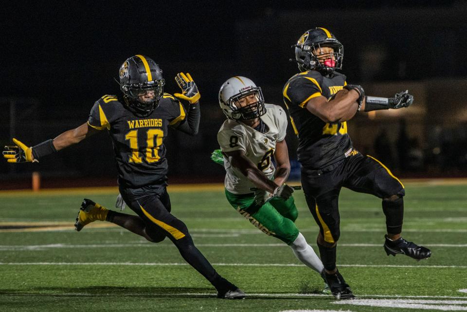 Watkins Memorial senior DaaVion Long returns a punt for a touchdown during their non-conference game against Northland at Ascena Stadium on Sept. 23, 2022. The Warriors' 22-0 victory against the Vikings moved them to 5-1.