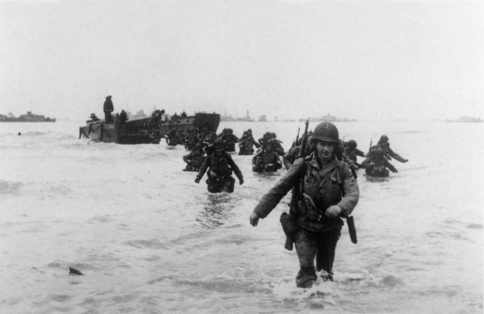 U.S. troops of the 4th Infantry Division "Famous Fourth" land on Utah Beach as Allied forces storm the Normandy beaches on June 6, 1944.