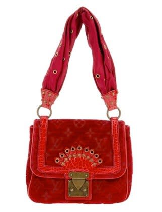 <div class="caption-credit"> Photo by: Photo: Courtesy of farfetch.com</div><b>2. Louis Vuitton</b> <br> <i><br> velvet and crocodile skin bag, $1,910, louis vuitton, farfetch.com <br></i> <br>