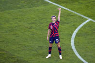 United States' Megan Rapinoe celebrates scoring her side's second goal against Australia during the women's bronze medal soccer match at the 2020 Summer Olympics, Thursday, Aug. 5, 2021, in Kashima, Japan. (AP Photo/Kiichiro Sato)