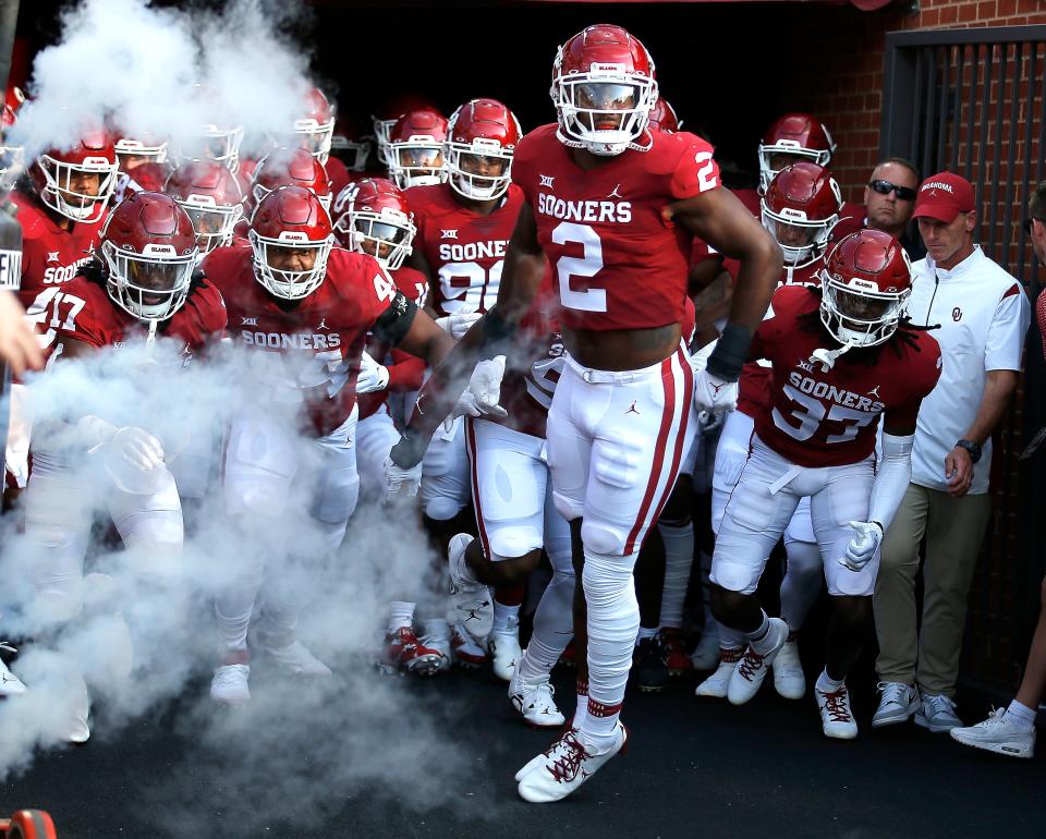 Linebacker David Ugwoegbu (2) leads the Sooners out to the field before facing Kent Stadium on Sept. 10, 2022, in Norman.