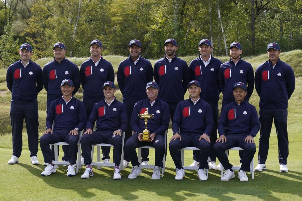 Team USA poses for a picture on the 18th hole during a practice day at the Ryder Cup at the Whistling Straits Golf Course Wednesday, Sept. 22, 2021, in Sheboygan, Wis. (AP Photo/Charlie Neibergall)