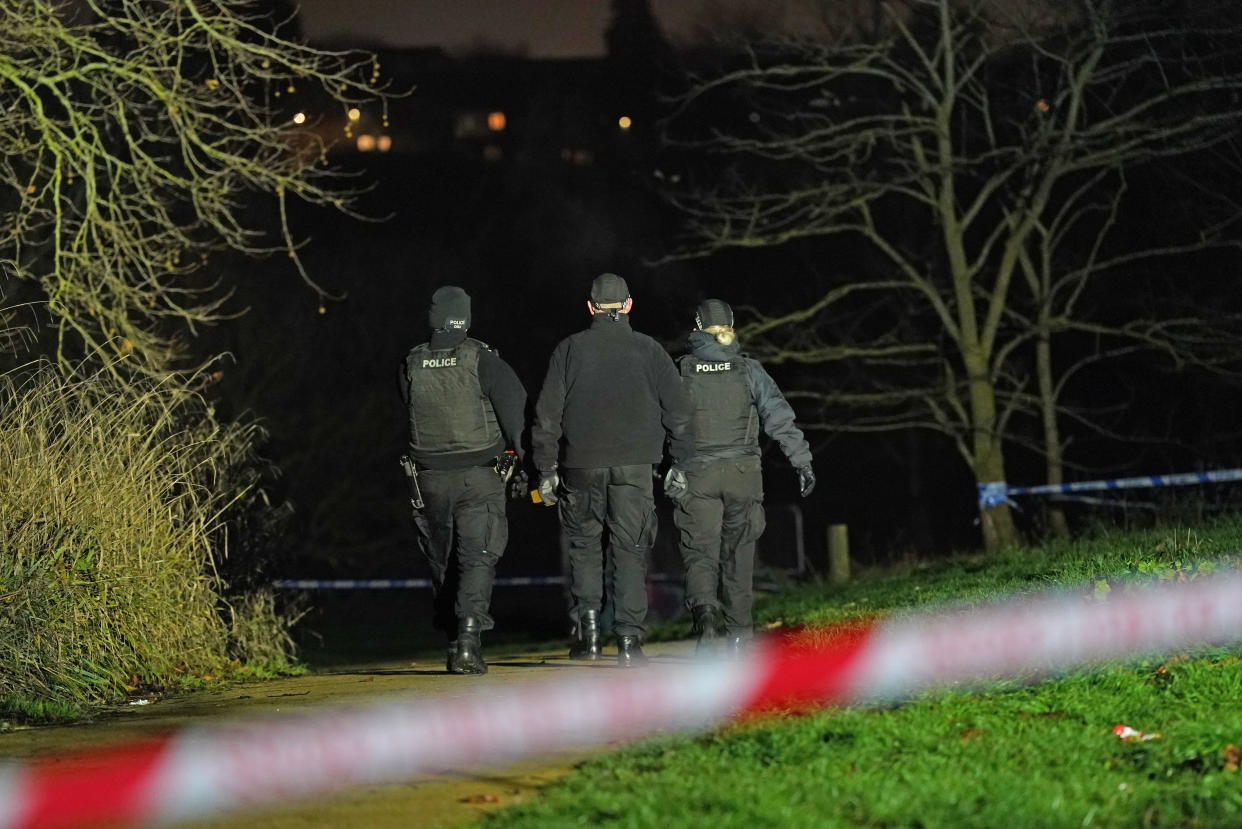 Police at the scene in Babbs Mill Park in Kingshurst, Solihull after a serious incident where several people are believed to be in a critical condition after being pulled from the lake. Picture date: Sunday December 11, 2022.