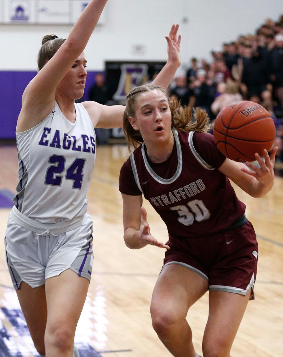 Strafford's Elsie Larsen grabs a loose ball during her team's visit to play the Fair Grove Eagles on February 15, 2024.