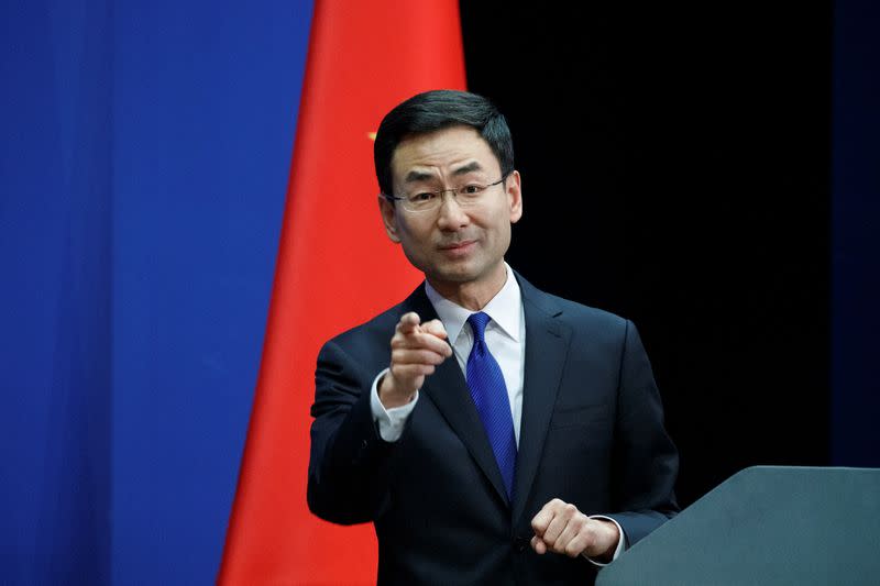 Chinese Foreign Ministry spokesman Geng Shuang takes a question from a journalist during the daily press briefing of the Foreign Ministry in Beijing