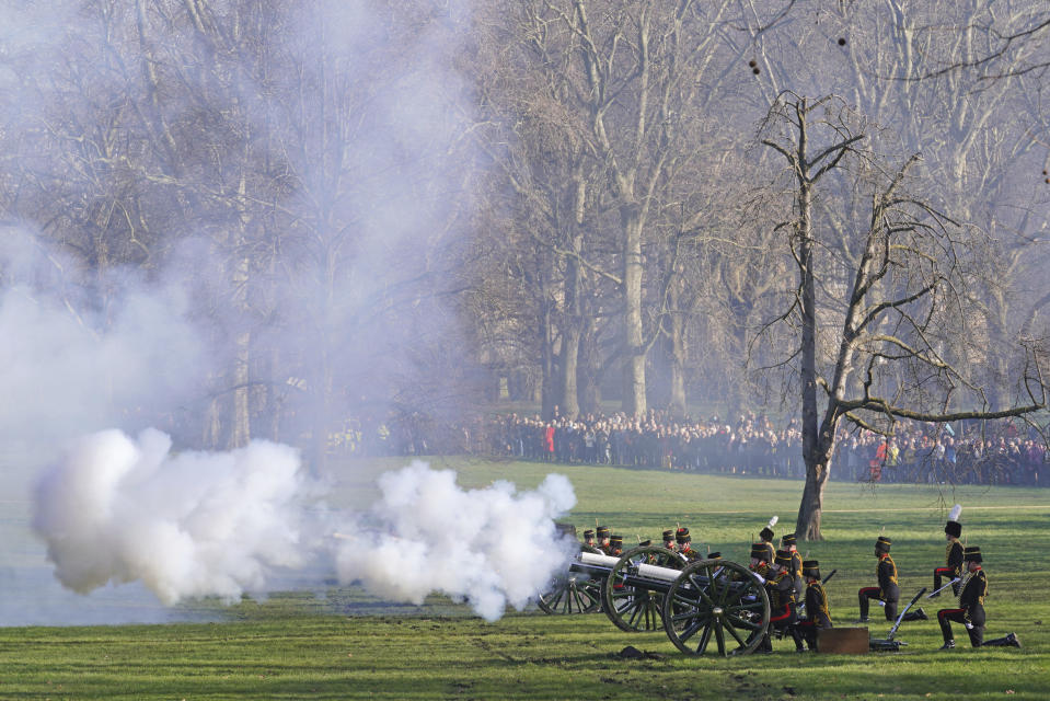 Members of the King's Troop, Royal Horse Artillery fire a gun salute in Green Park, to mark the official start of the Platinum Jubilee, in London, Monday, Feb. 7, 2022. (Jonathan Brady/PA via AP)