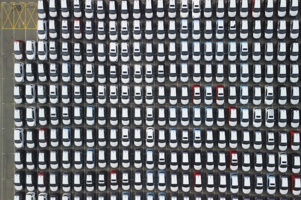 In this photo released by Xinhua News Agency, an aerial drone photo taken on Jan. 16, 2024, shows vehicles at a terminal of Dalian Port, northeast China's Liaoning Province. China's economy for the Oct-Dec quarter grew at a quicker rate, allowing the Chinese government to hit its annual growth target of about 5% for 2023 even as trade and economic recovery remained uneven. (Chen Wei/Xinhua via AP)