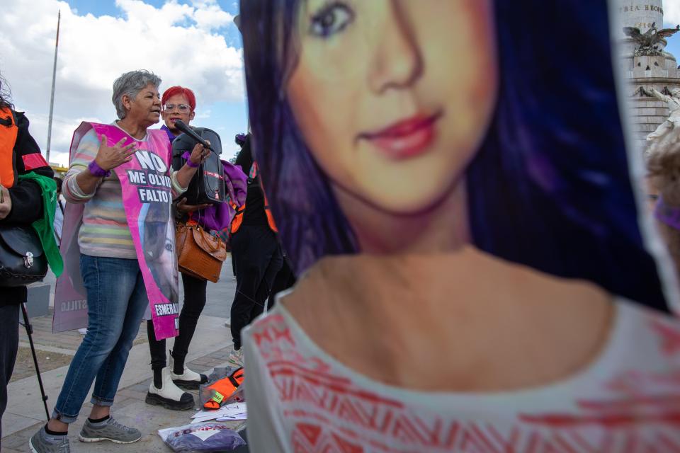 Julieta Castillo speaks to the crowd before the women's march begins in Ciudad Juárez, March 8, 2024. Other relatives carried larger-than-life of figures of Castillo's niece, Esmeralda, who disappeared in 2009.