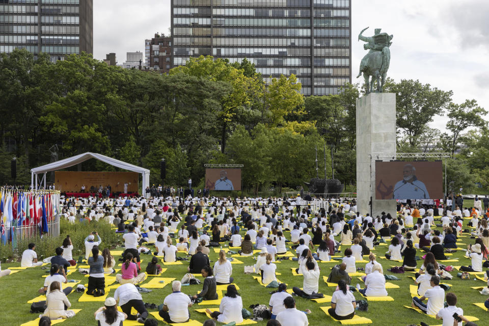 India Prime Minister Narendra Modi appress on the screen during the International Yoga day event at United Nations headquarters in New York on Wednesday, June 21, 2023. (AP Photo/Jeenah Moon)