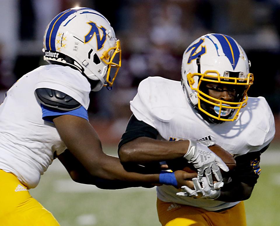 Mt. Healthy running back Kaleb Jones, right, ran for 758 yards and nine touchdowns in 2022.