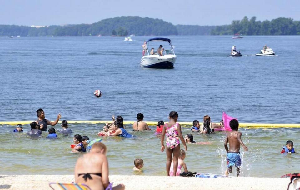 Families enjoy Ramsey Creek beach on Lake Norman near Cornelius.