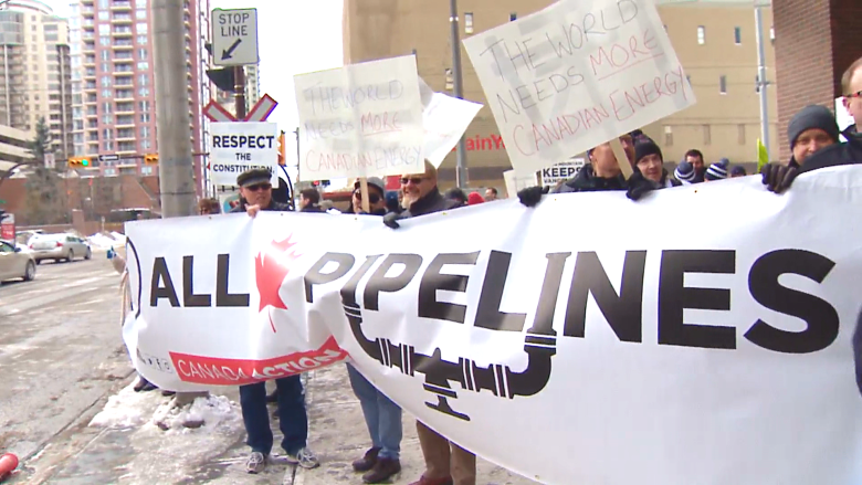 Protesters rally outside Kent Hehr's office in support of Trans Mountain pipeline