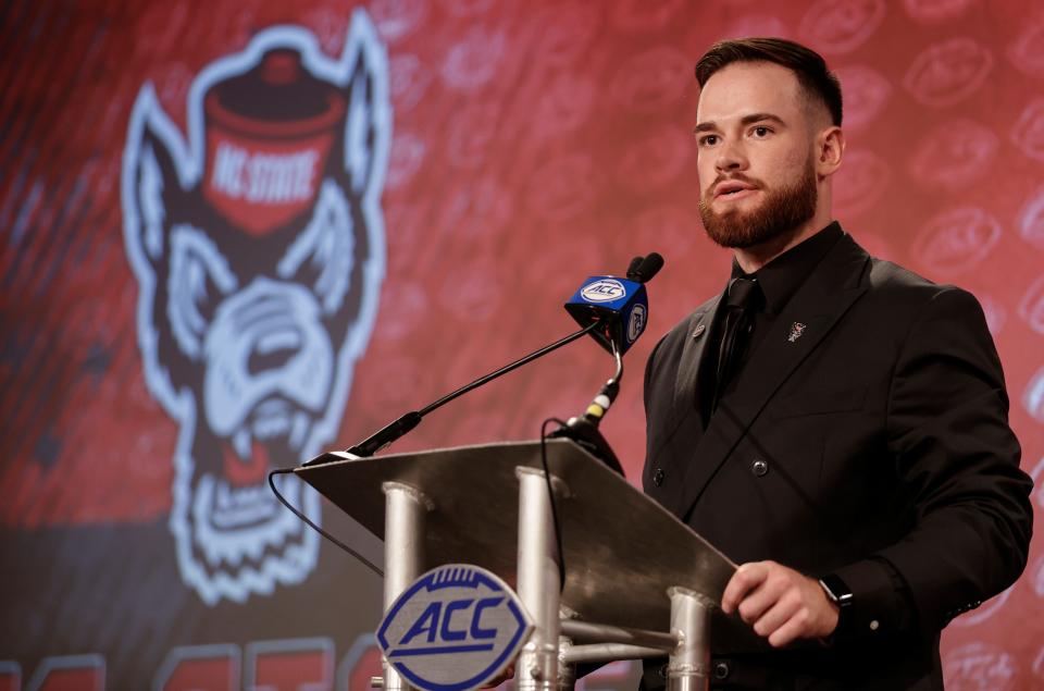 North Carolina State quarterback Devin Leary answers a question at the NCAA college football Atlantic Coast Conference Media Days in Charlotte, N.C., Wednesday, July 20, 2022.