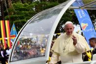 Pope Francis received a rapturous welcome as he arrived at a shrine to the martyrs at Namugongo, just outside the capital Kampala