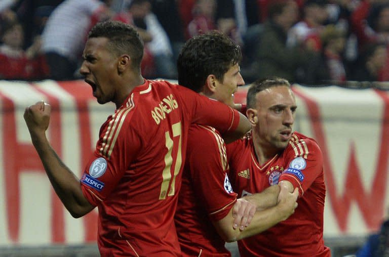 Bayern Munich players celebrate after scoring a second goal during their Champions League semi final first leg match against Barcelona at the Allianz Arena in Munich, on April 23, 2013