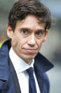 British Conservative party leadership contender Rory Stewart arrives for a live TV debate in central London Tuesday, June 18, 2019. Britain's Conservative Party is holding a contest to replace Prime Minister Theresa May, and party legislators will continue to hold elimination votes until the final two contenders will be put to a vote of Conservative Party members nationwide, with the winner due to become Conservative Party leader and prime minister. (AP Photo/Vudi Xhymshiti)