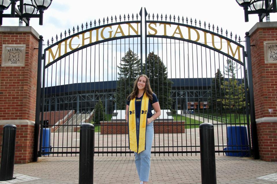 Abbey McNeil, 23, who grew up on Grosse Ile, is a University of Michigan alum who has found camaraderie with other alumni in the Baltimore area, where she now lives, watching the football team's winning season.