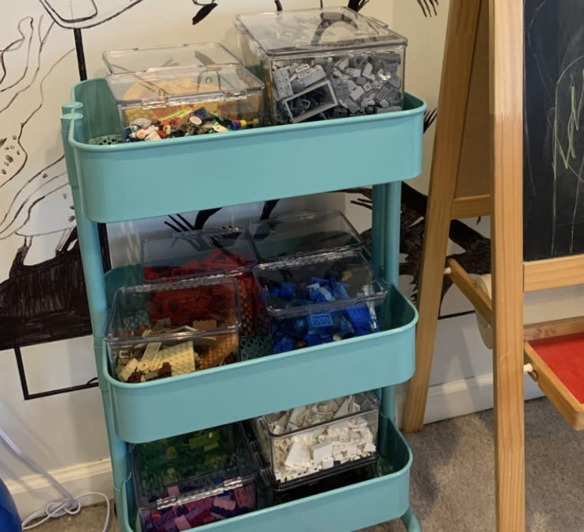 Organizing toys by color inside simple plastic containers is a great way to stay aware of what's in your playroom, according to Wallen. (Photo: Tarah Cheffi)